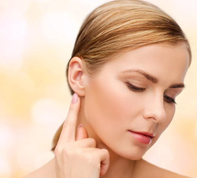 Torn and Split Earlobe Repair in Dallas, TX - Earlobe Reduction